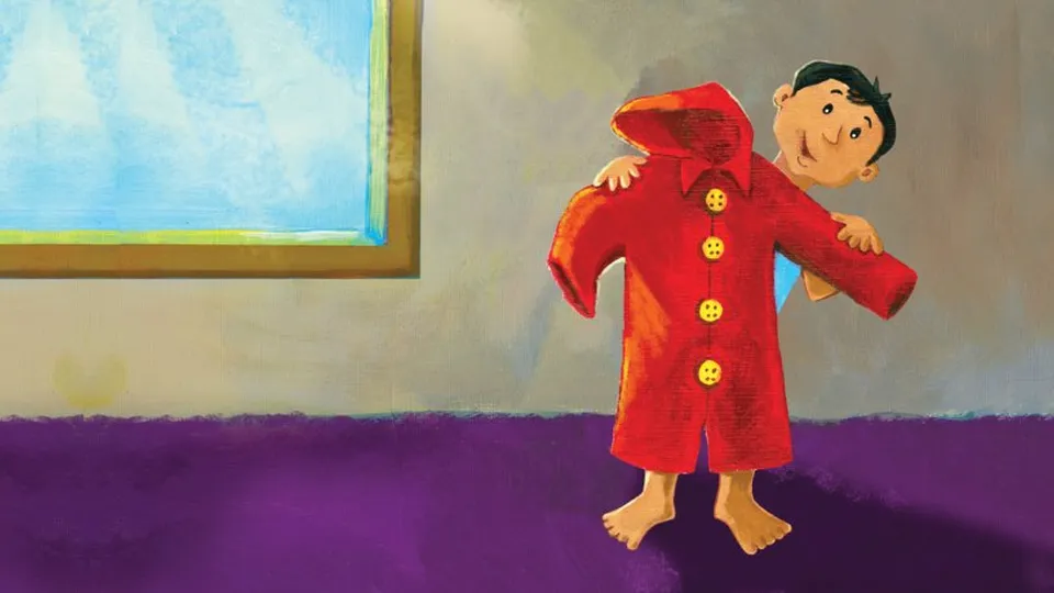 Un petit garçon qui brandit un imperméable rouge, l’illustration de couverture de The Red Raincoat sur StoryWeaver